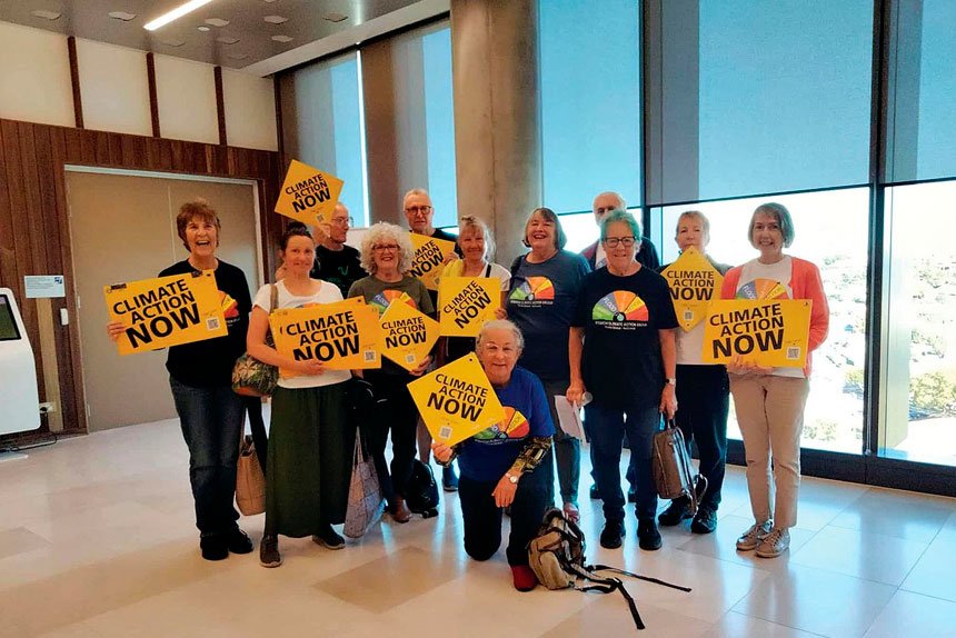TIME TO ACT: Members of the Ipswich Climate Action Group descend on Ipswich City Council chambers last week.