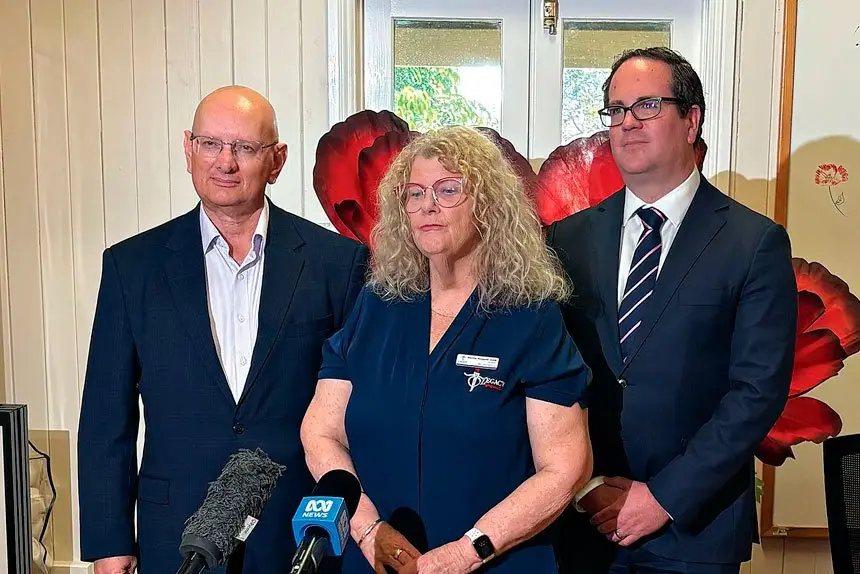 UNITED SUPPORT: Ipswich Legacy President Donna Reggett with Shayne Neumann and Matt Keogh.