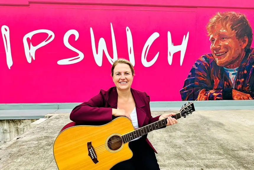 PERFECT PLAN: Ipswich Mayor Teresa Harding with artist Duncan Mattocks’ huge mural.