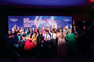 WINNING SMILES: The business community celebrates.