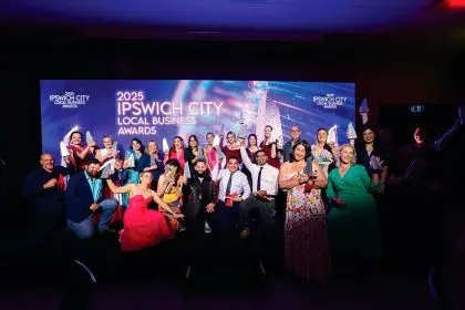 WINNING SMILES: The business community celebrates.