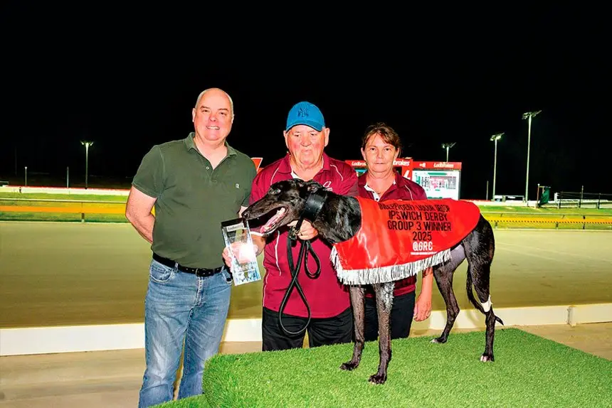 Queensland Greyhound Racing Cup Board Chair David Nugent with Ipswich Derby winner Fire Me Up and Connections.