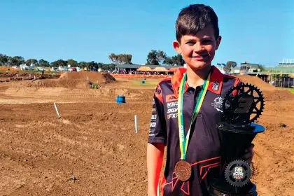 Jake Knighton is proud of his third place in the 65cc class.