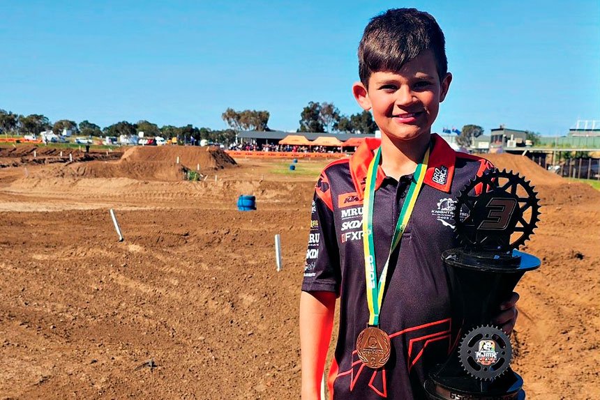 Jake Knighton is proud of his third place in the 65cc class.