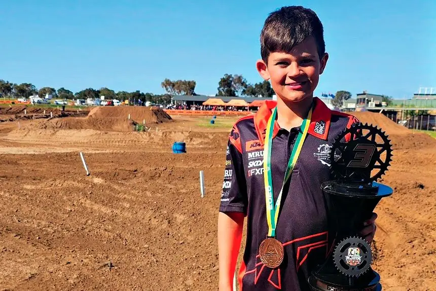 Jake Knighton is proud of his third place in the 65cc class.