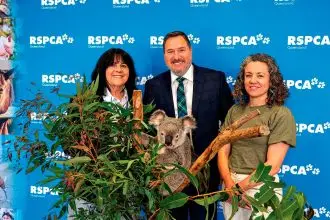 Environment Minister Andrew Powell joins RSPCA Queensland Chair Louise Cox, left, and CEO Emma Whitehead at the RSPCA headquarters at Wacol to sign the grant agreement for the new wildlife hospitals.