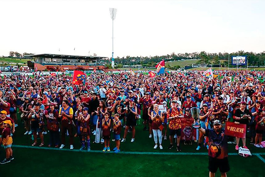 LOYAL FANS: Excited Lions supporters celebrate the win with their heroes.