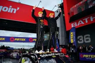 Matt Payne of Grove Racing celebrates with co-driver Garth Tander after winning the Supercars Championship Bathurst 1000 at Mount Panorama Circuit earlier this month. PHOTO: AAP Image/Dan Himbrechts