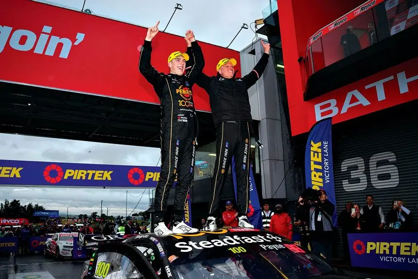 Matt Payne of Grove Racing celebrates with co-driver Garth Tander after winning the Supercars Championship Bathurst 1000 at Mount Panorama Circuit earlier this month. PHOTO: AAP Image/Dan Himbrechts