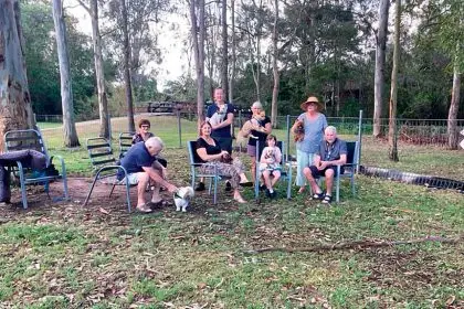 BYO CHAIRS: A group of frustrated Camira dog lovers in their local dog park, and the trees in question.