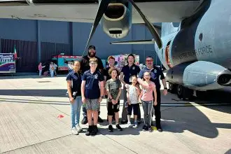 ABOVE: The next generations remembering everything those who served have and continue to do for our freedom. RIGHT: Abigail West.