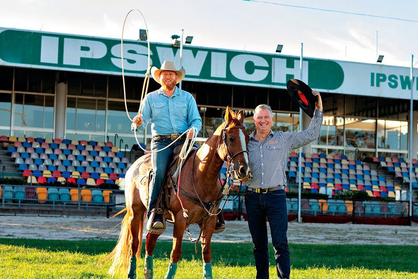 ACTION TIME: Rosewood Rope and Tie competitor Jay Green with Ipswich Show Society President Darren Zanow.