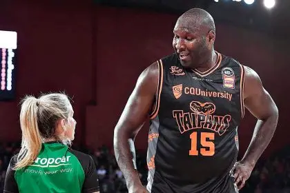 Toni Caldwell retired from elite level refereeing in 2020 – here she’s pictured with former NBL star and big man Nate Jawai (Facebook).