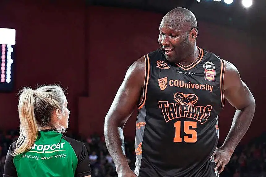 Toni Caldwell retired from elite level refereeing in 2020 – here she’s pictured with former NBL star and big man Nate Jawai (Facebook).