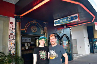 PROUD OWNERS: Banshees Bar & Artspace owners Al Wheeler and Tim Glorious in front of the new-look venue.