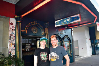 PROUD OWNERS: Banshees Bar & Artspace owners Al Wheeler and Tim Glorious in front of the new-look venue.