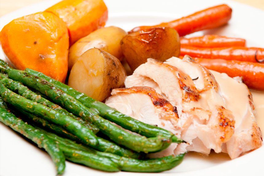 FESTIVE DINING: A classic roast turkey meal served with seasonal vegetables.