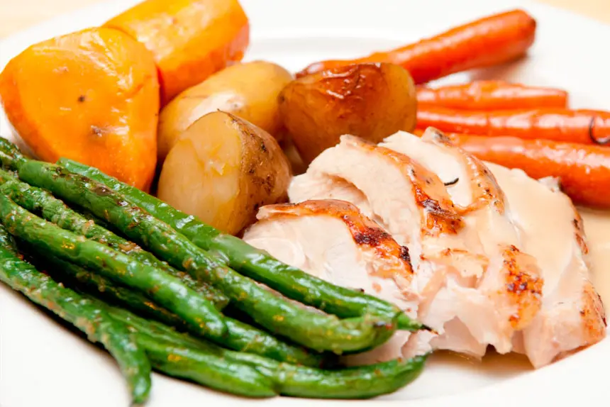 FESTIVE DINING: A classic roast turkey meal served with seasonal vegetables.
