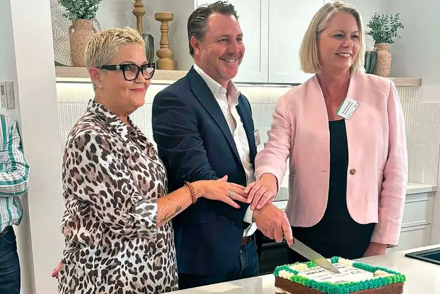 Tanya Milligan, Kane Davis and Sue-Ann Fresneda joined in a cake-cutting