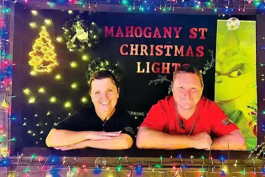 POWER COUPLE: Mick and Kym Watkins at their Christmas lights display.