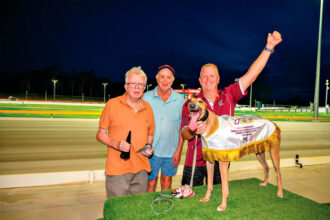 Wolf Creek celebrates another win with trainer Tony Brett and connections. PHOTO: Queensland Greyhound Racing Club facebook via Box 1 Photography
