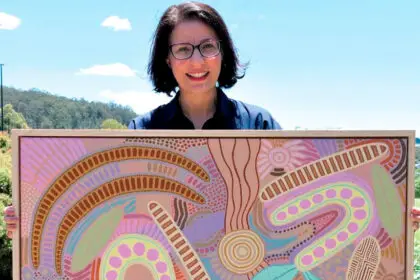 PROUD POLLIE: State Member for Jordan Charis Mullen with artwork.