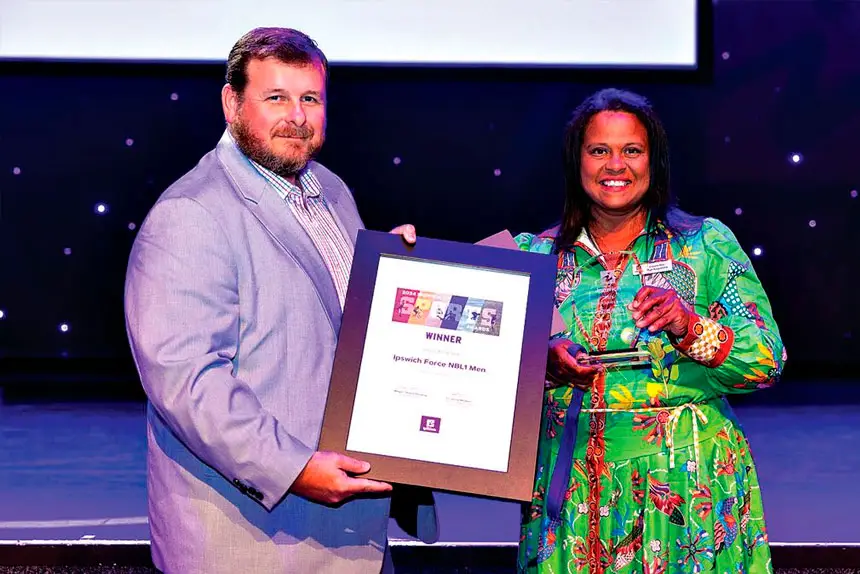 GREAT SUCCESS: Ipswich State High School teacher and coach Chris Riches with Cr Pye Augustine.