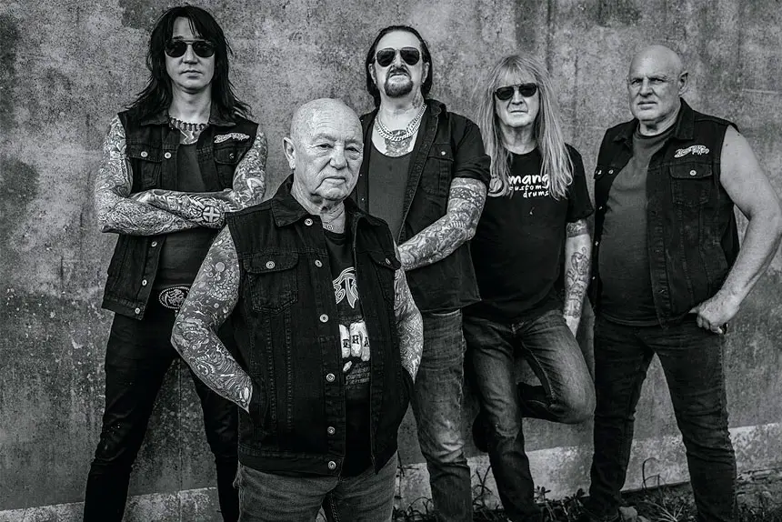 ROCKING ON: Older but wiser ... Angry Anderson with his Rose Tattoo bandmates.