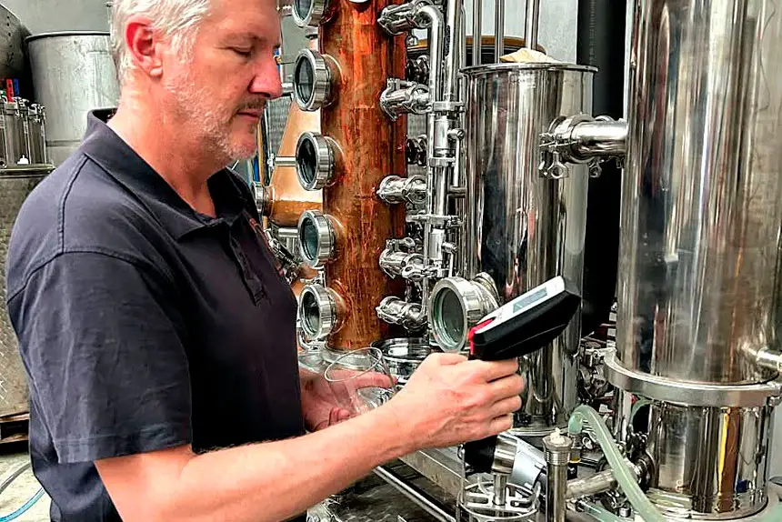 Jason Hannay controlling quality at Imbibis Craft Distillery.