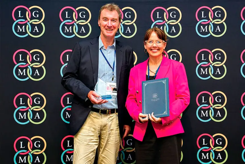PROUD MOMENT: Scenic Rim Regional Council CEO David Keenan accepts the LGMA award from Acting Executive Director Strategy and Service Delivery Kristy Nau.
