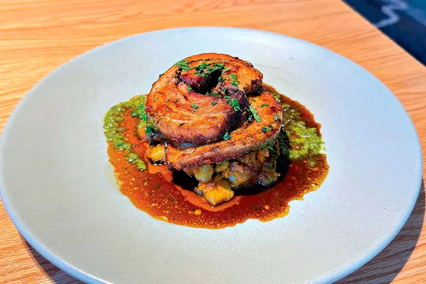Leading the menu is a devine Oven Roasted Porchetta, featuring succulent slow-roasted pork.