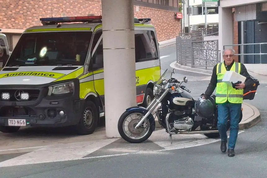 BLOODY GOOD: Pictured above, a Blood Bikes Australia team member makes another delivery run.