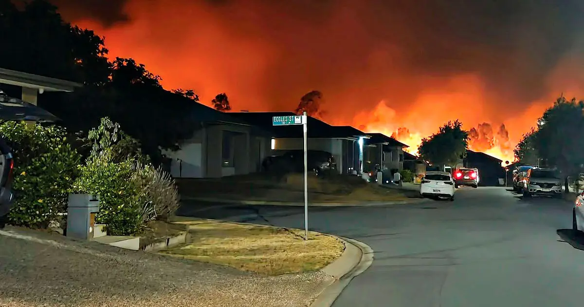 LUCKY ESCAPE: The fire pushed dangerously close to homes and tested crews on the ground.