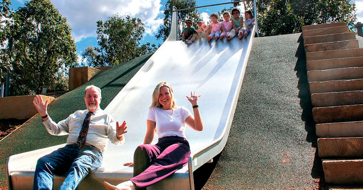 Cr Paul Tully and Cr Nicole Jonic test the new slide.