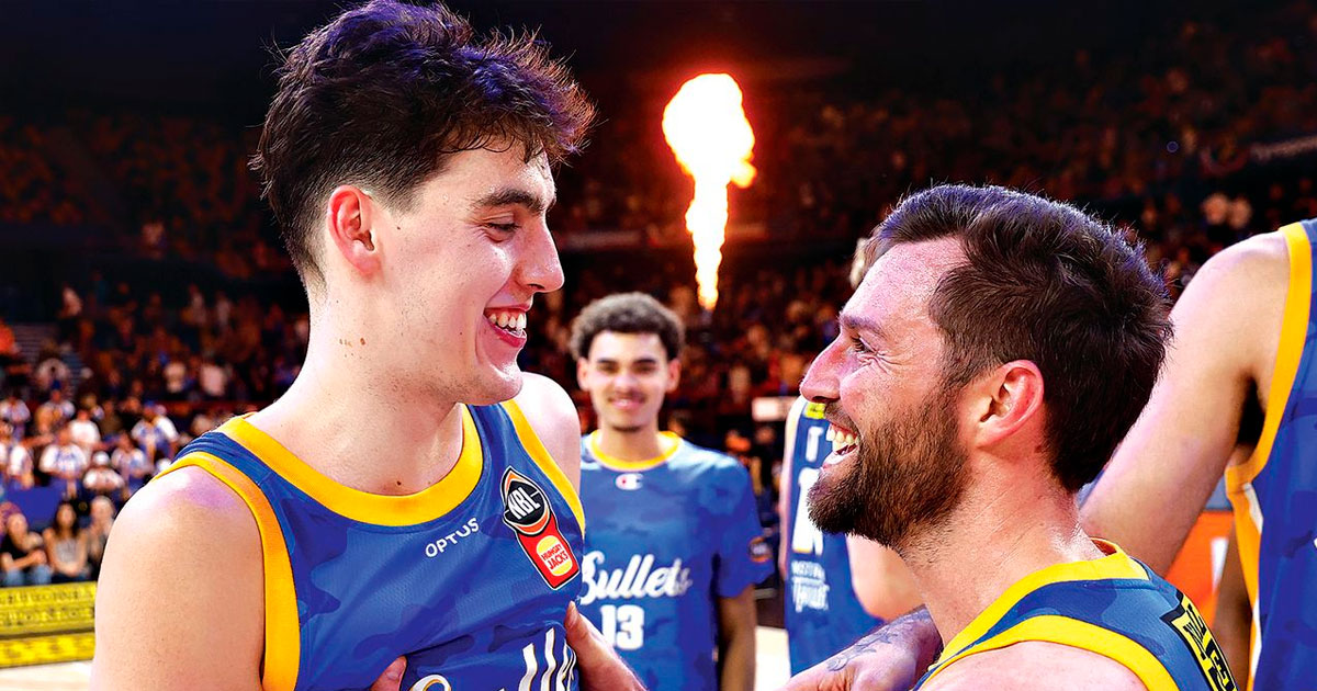 Max Mackinnon celebrates with 400-gamer Mitch Norton.